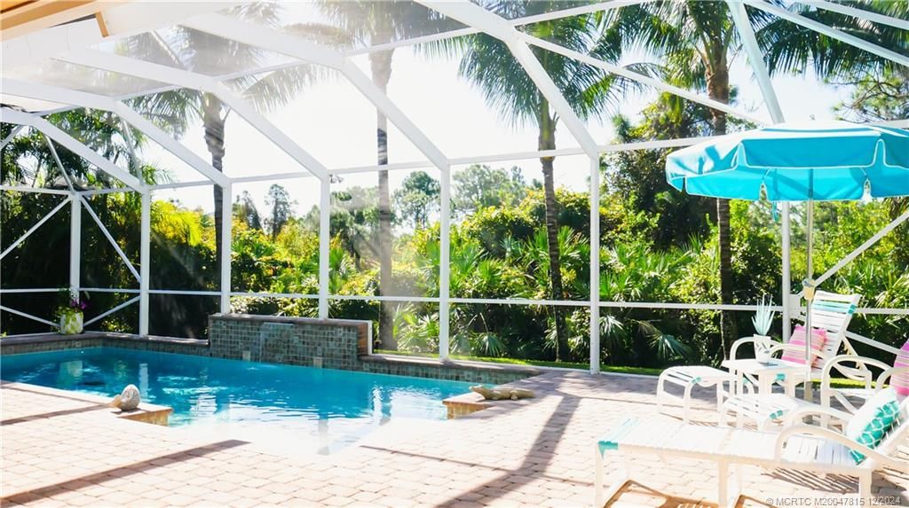 Photo of 528 NW Windflower Terrace, Jensen Beach, FL 34957 (MLS # M20047815)