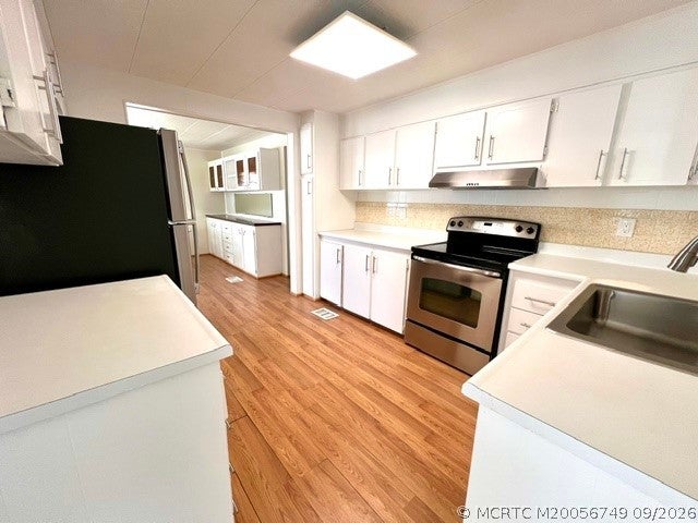 Photo of 6250 Ficus Lane, Lantana, FL 33462 (MLS # M20056749)