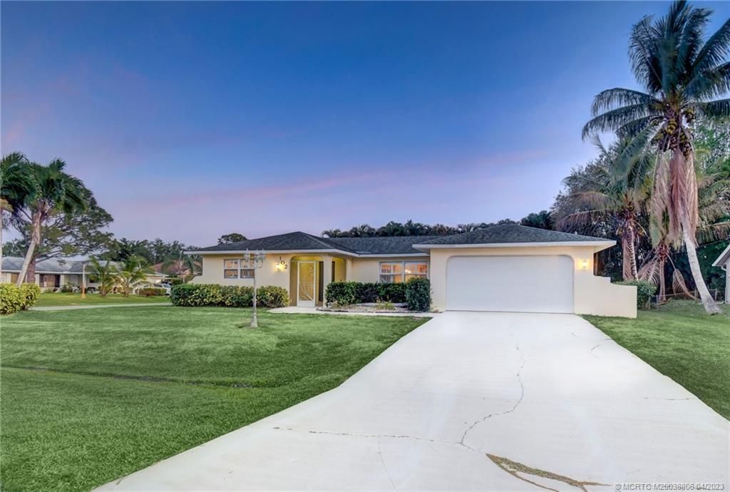 Photo of 102 SW Airview Avenue, Port Saint Lucie, FL 34984 (MLS # M20038806)