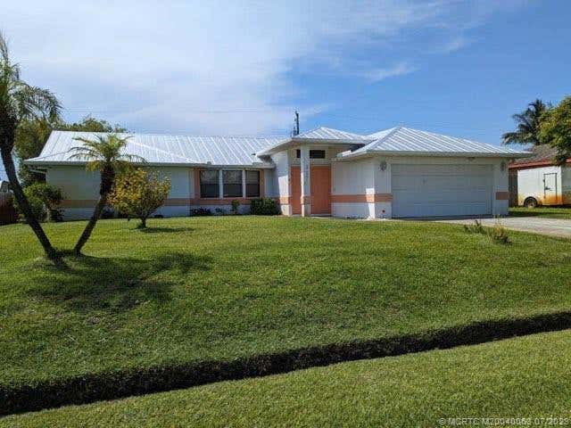 Photo of 317 SE Strait Avenue, Port Saint Lucie, FL 34983 (MLS # M20040063)