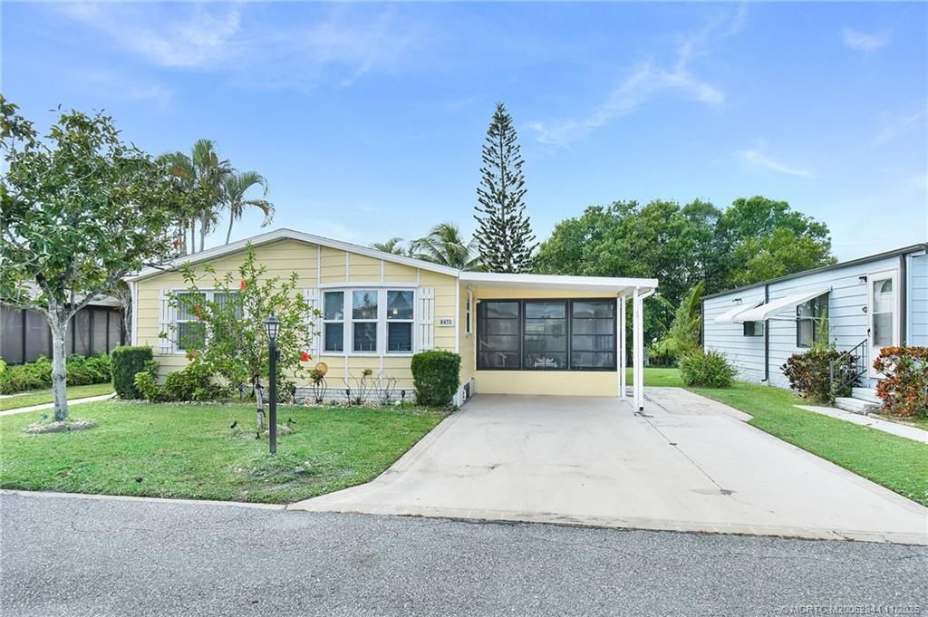 Photo of 8471 Florence Drive, Port Saint Lucie, FL 34952 (MLS # M20052844)