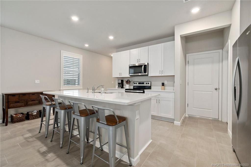 Photo of 213 Osprey Preserve Boulevard, Jensen Beach, FL 34957 (MLS # M20039691)