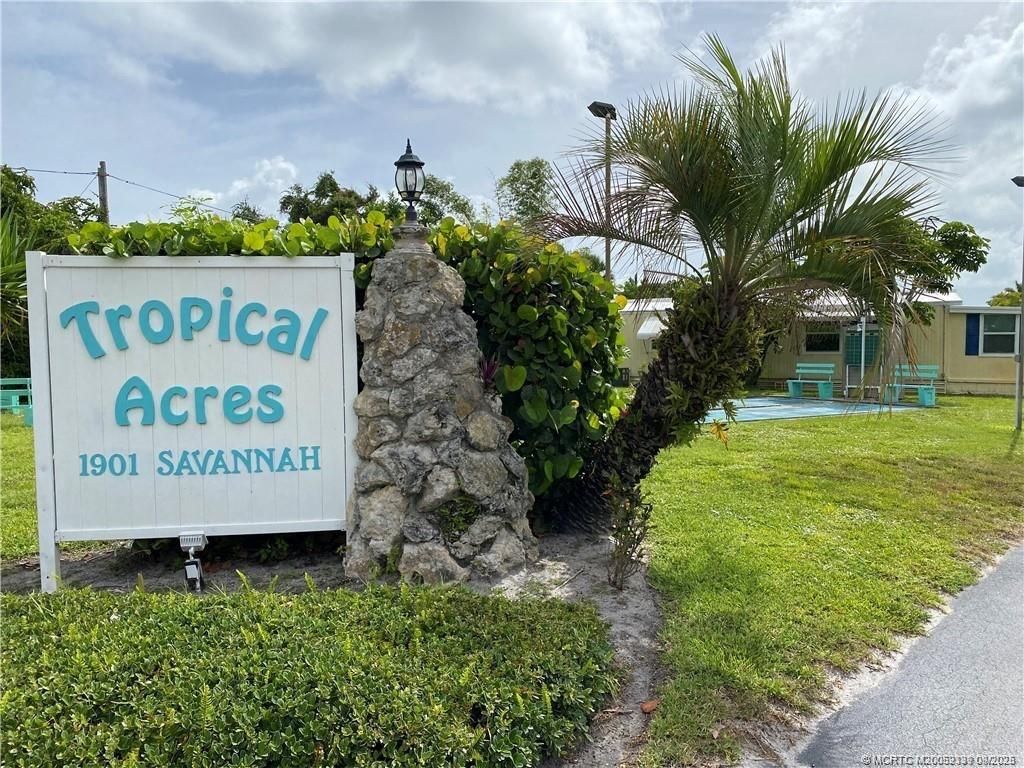 Photo of 603 NE Tahiti Way NE, Jensen Beach, FL 34957 (MLS # M20052339)