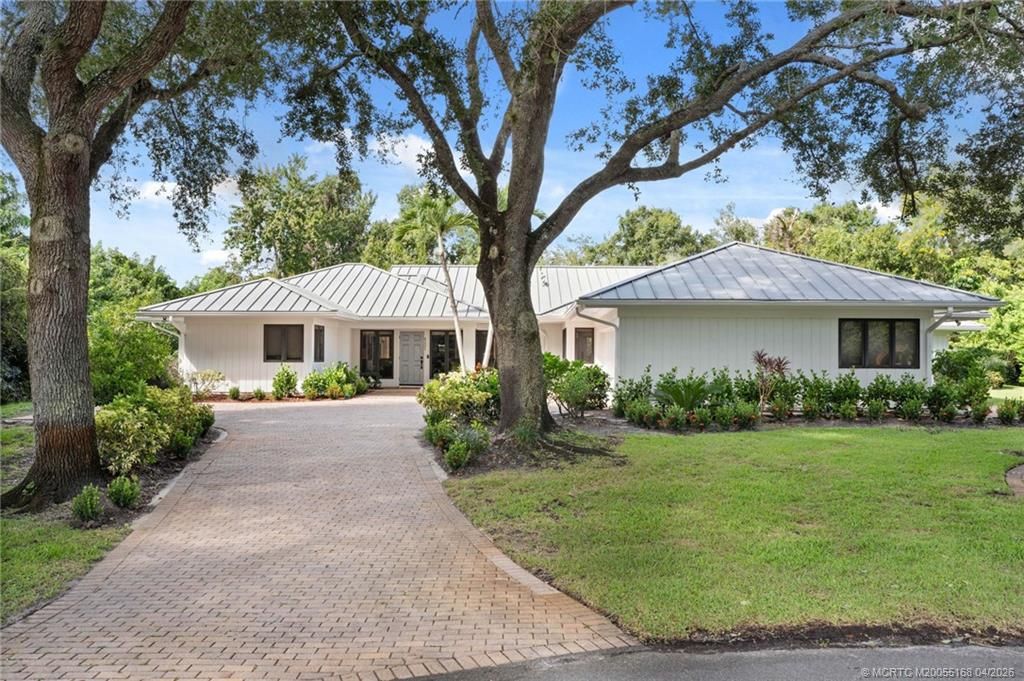 Photo of 6221 SW Thistle Terrace, Palm City, FL 34990 (MLS # M20055168)