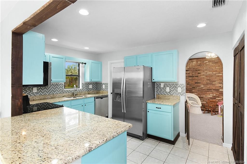 Photo of 6011 Pinetree Drive, Fort Pierce, FL 34982 (MLS # M20045137)