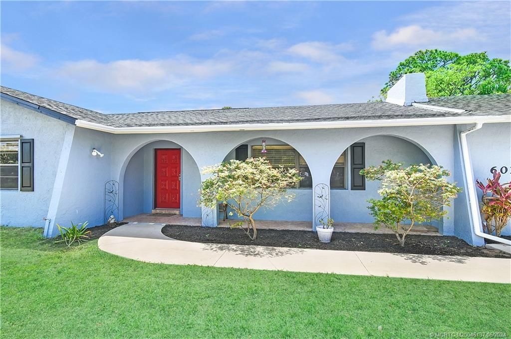 Photo of 6011 Pinetree Drive, Fort Pierce, FL 34982 (MLS # M20045137)