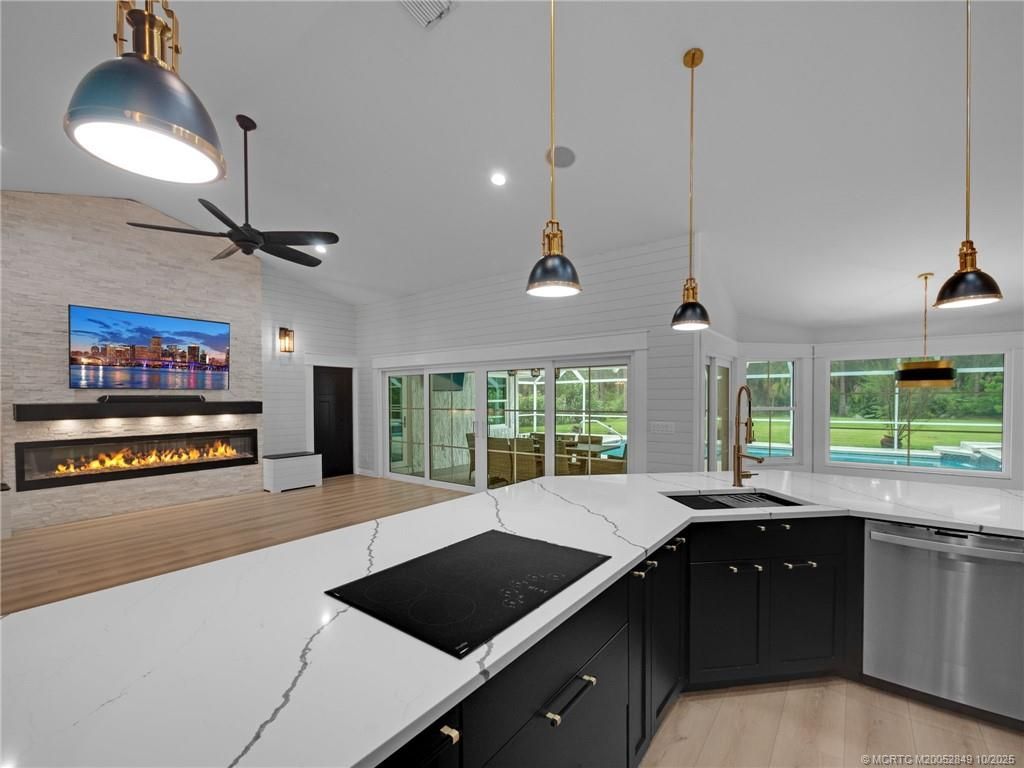 Photo of 8025 SW Yachtsmans Drive, Stuart, FL 34997 (MLS # M20052849)