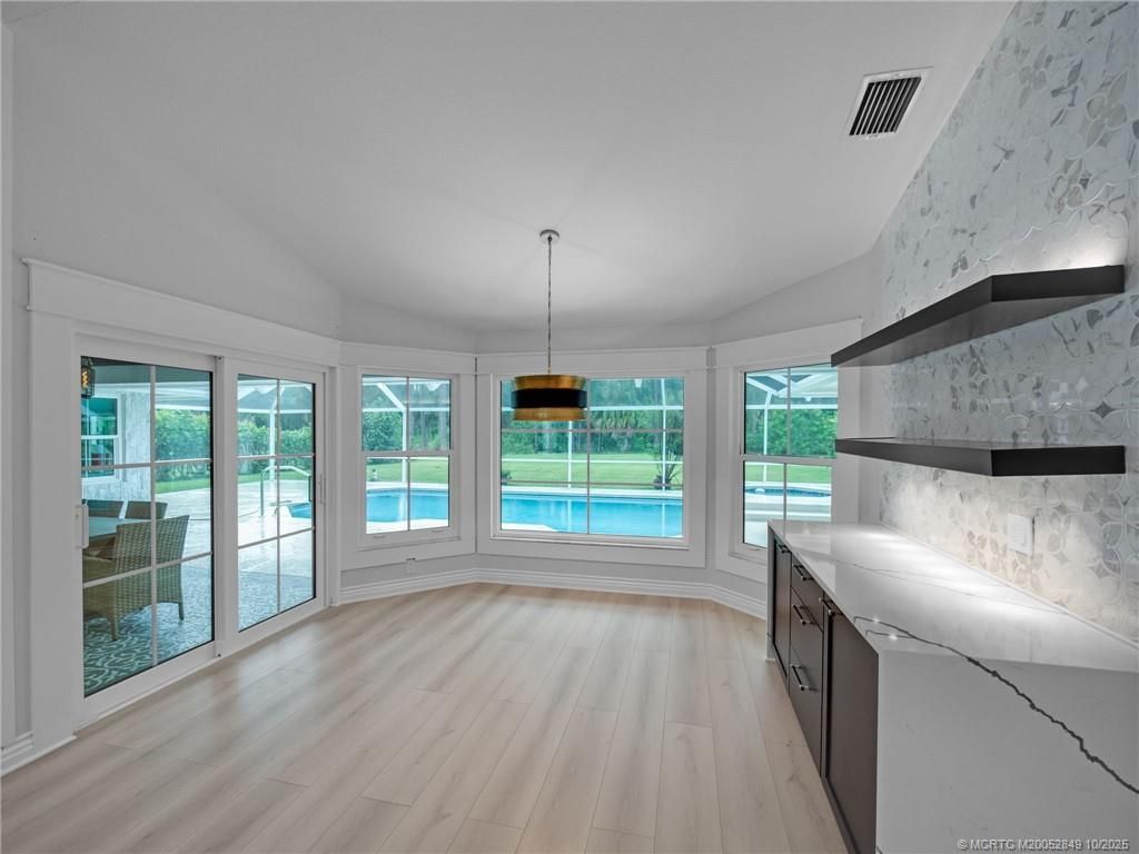 Photo of 8025 SW Yachtsmans Drive, Stuart, FL 34997 (MLS # M20052849)