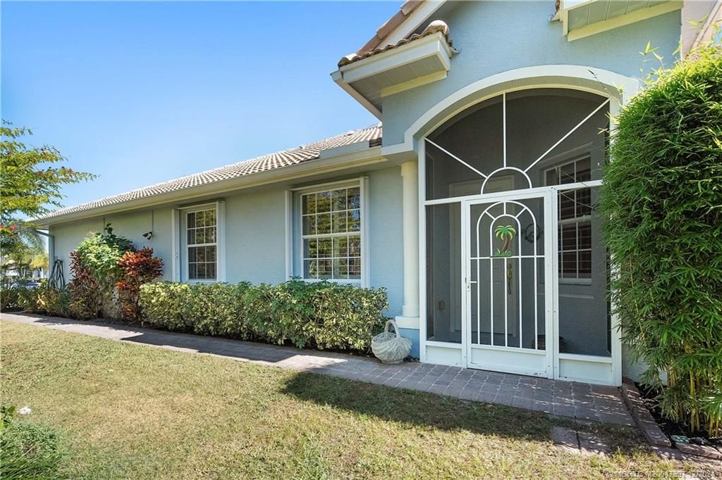 Photo of 490 NW Red Pine Way, Jensen Beach, FL 34957 (MLS # M20047897)