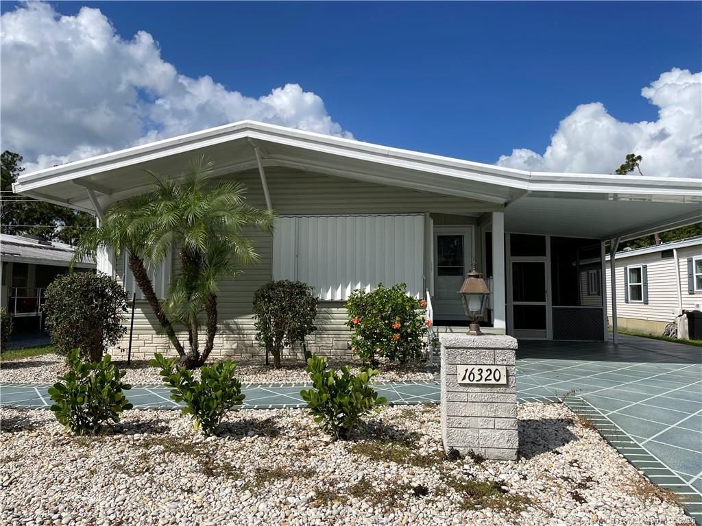 Photo of 16320 SW Indianwood Circle, Indiantown, FL 34956 (MLS # M20049814)