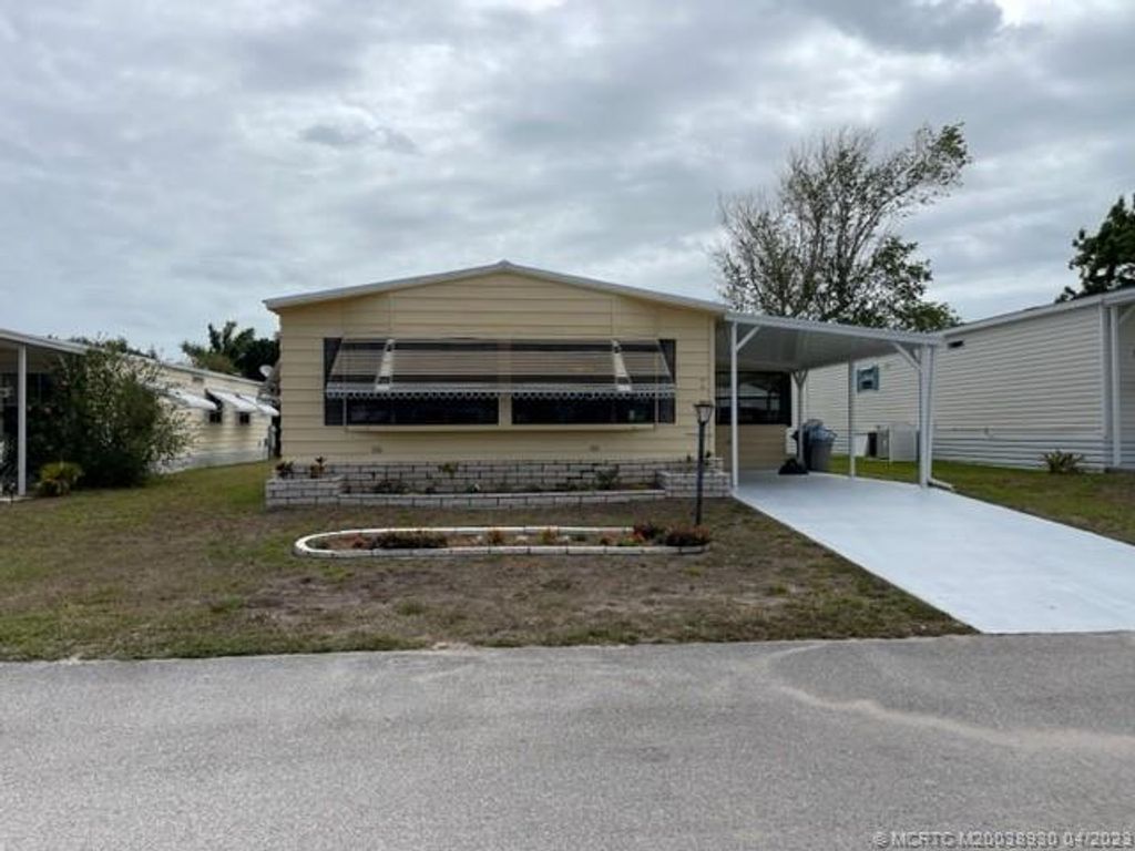 Photo of 7 Vista De Laguna, Fort Pierce, FL 34951 (MLS # M20038930)