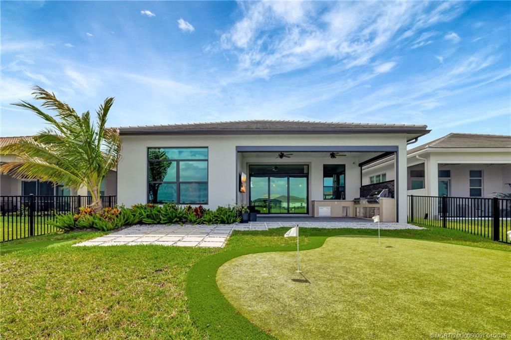 Photo of 9446 SW Pepoli Way, Port Saint Lucie, FL 34987 (MLS # M20050097)