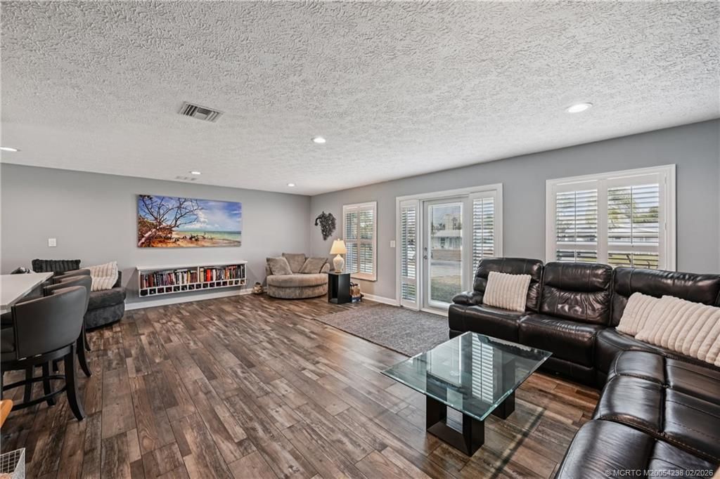 Photo of 1456 NE Hilltop Street, Jensen Beach, FL 34957 (MLS # M20054238)