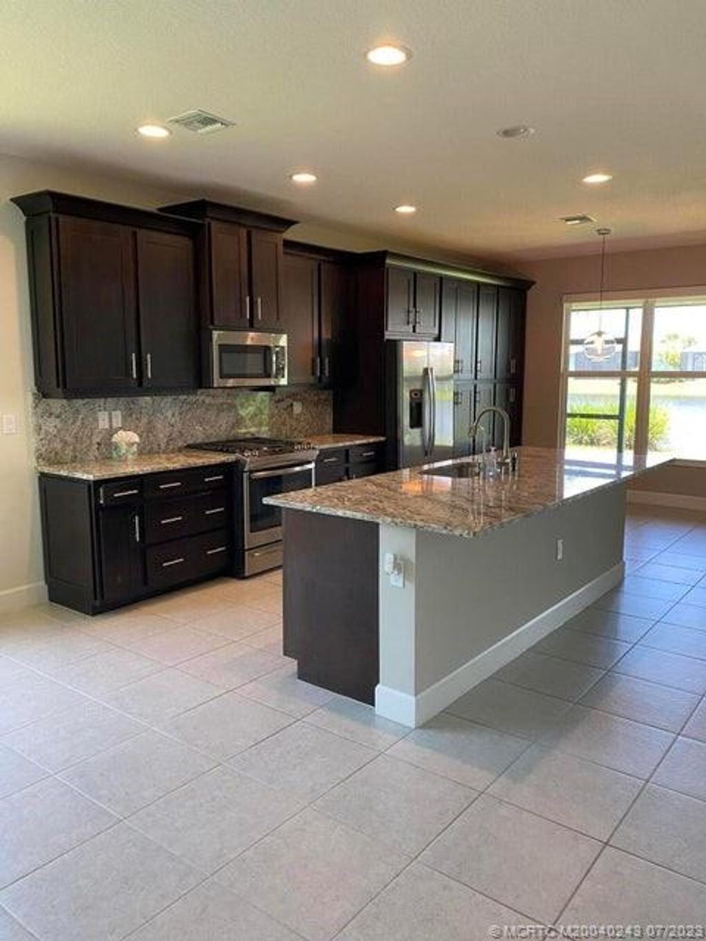 Photo of 10871 SW Sunray Street, Port Saint Lucie, FL 34987 (MLS # M20040243)