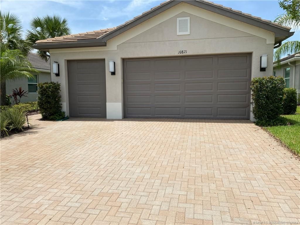 Photo of 10871 SW Sunray Street, Port Saint Lucie, FL 34987 (MLS # M20040243)