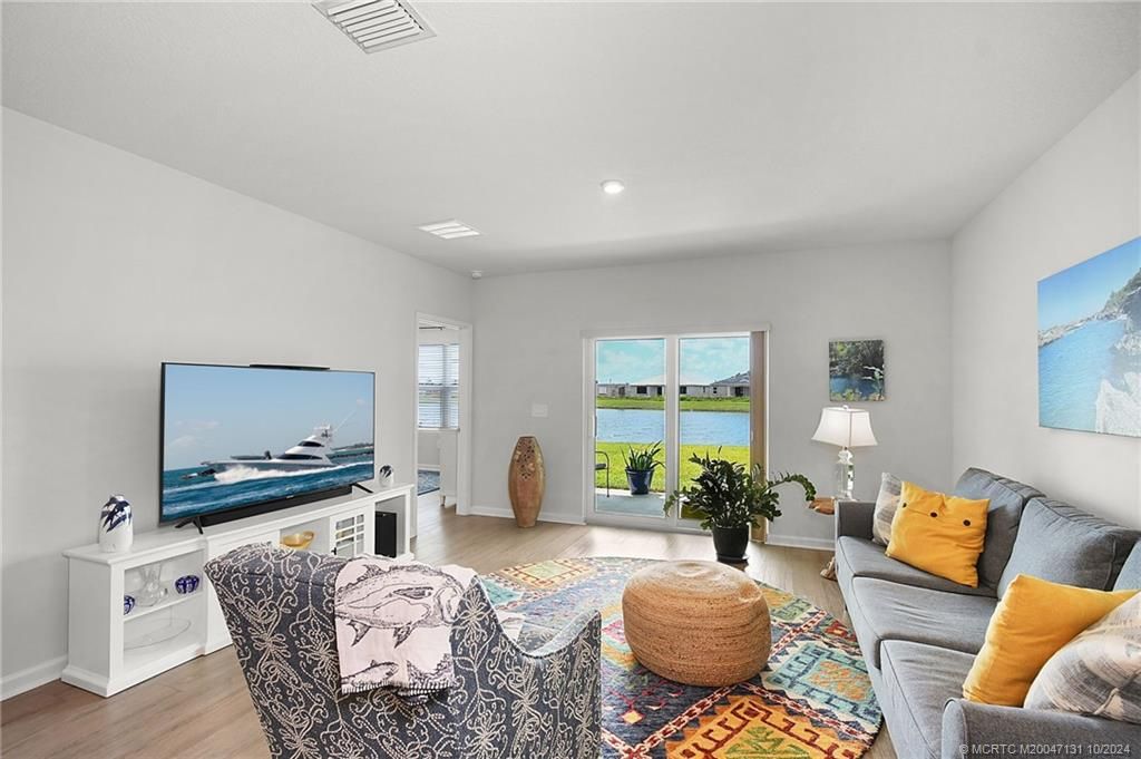 Photo of 9491 SW Libertas Way, Port Saint Lucie, FL 34987 (MLS # M20047131)