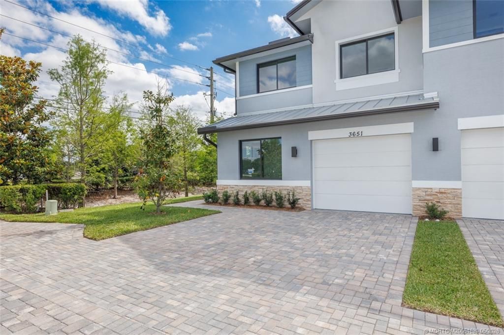 Photo of 3651 SW Magnolia Ridge Lane, Palm City, FL 34990 (MLS # M20051620)