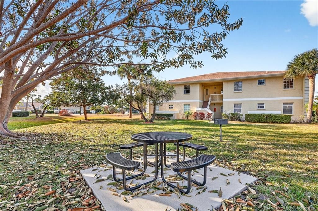 Photo of 1564 SE Royal Green Circle #104, Port Saint Lucie, FL 34952 (MLS # M20055192)