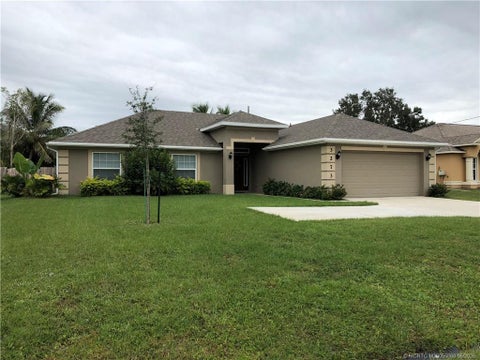 Photo of 3273 SW Rosser Boulevard, Port Saint Lucie, FL 34953 (MLS # M20055860)