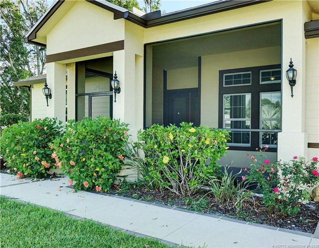 Photo of 2961 SW Boxwood Circle, Port Saint Lucie, FL 34953 (MLS # M20055298)