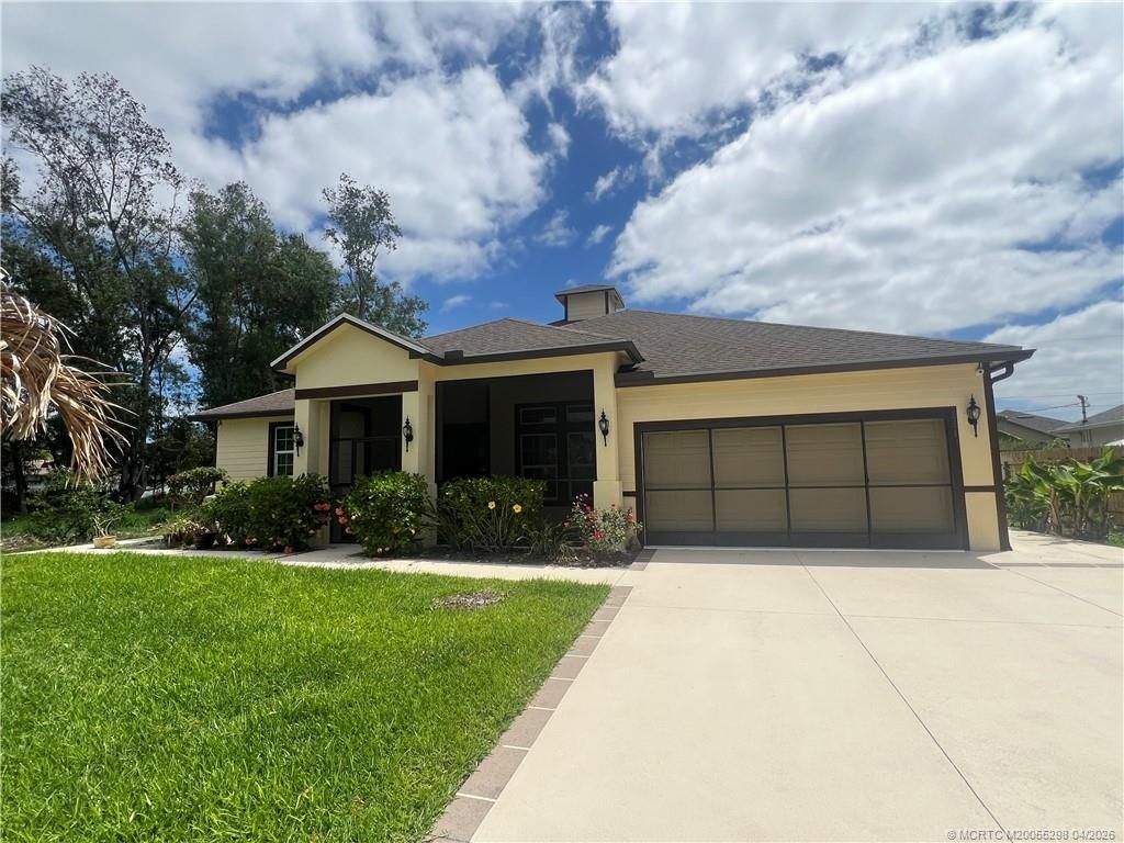 Photo of 2961 SW Boxwood Circle, Port Saint Lucie, FL 34953 (MLS # M20055298)