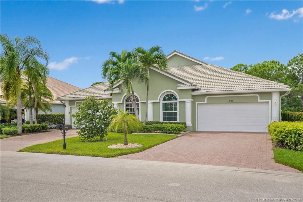 Photo of 590 NW Red Pine Way, Jensen Beach, FL 34957 (MLS # M20046664)