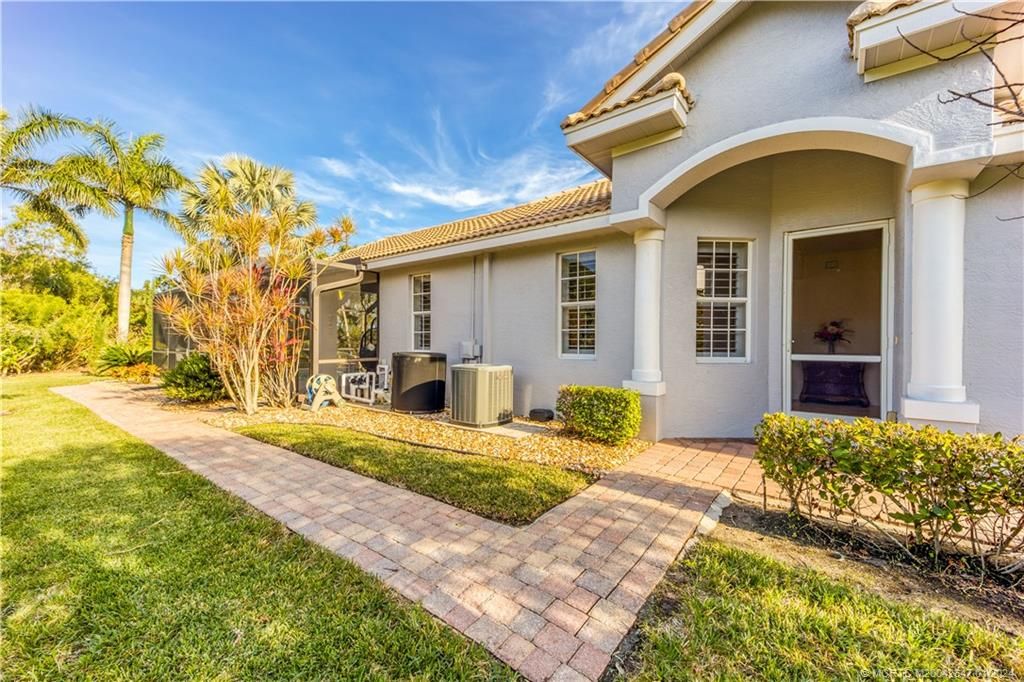Photo of 691 NW Red Pine Way, Jensen Beach, FL 34957 (MLS # M20042647)