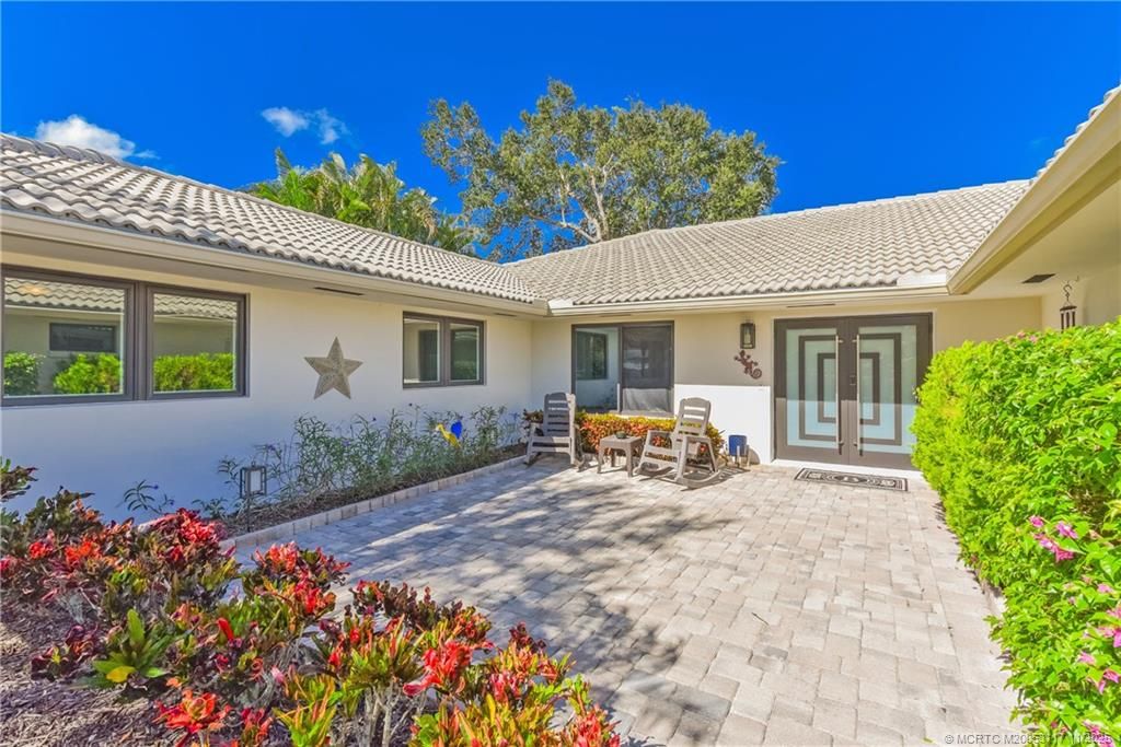 Photo of 4884 SW Loch Lane, Palm City, FL 34990 (MLS # M20053117)