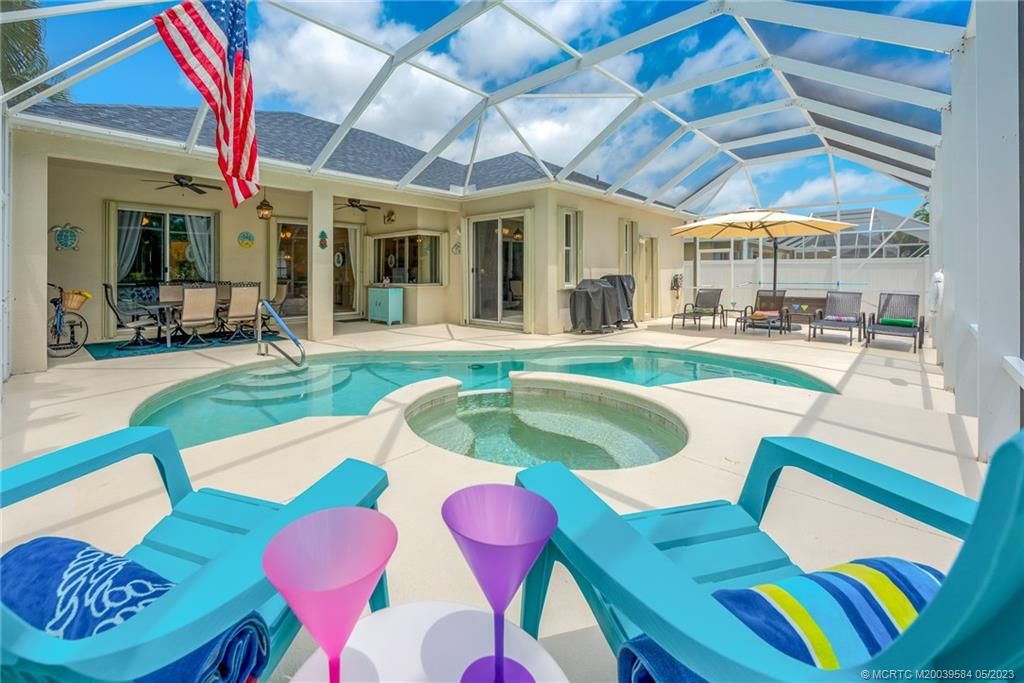 Photo of 2251 NW Windemere Drive, Jensen Beach, FL 34957 (MLS # M20039584)