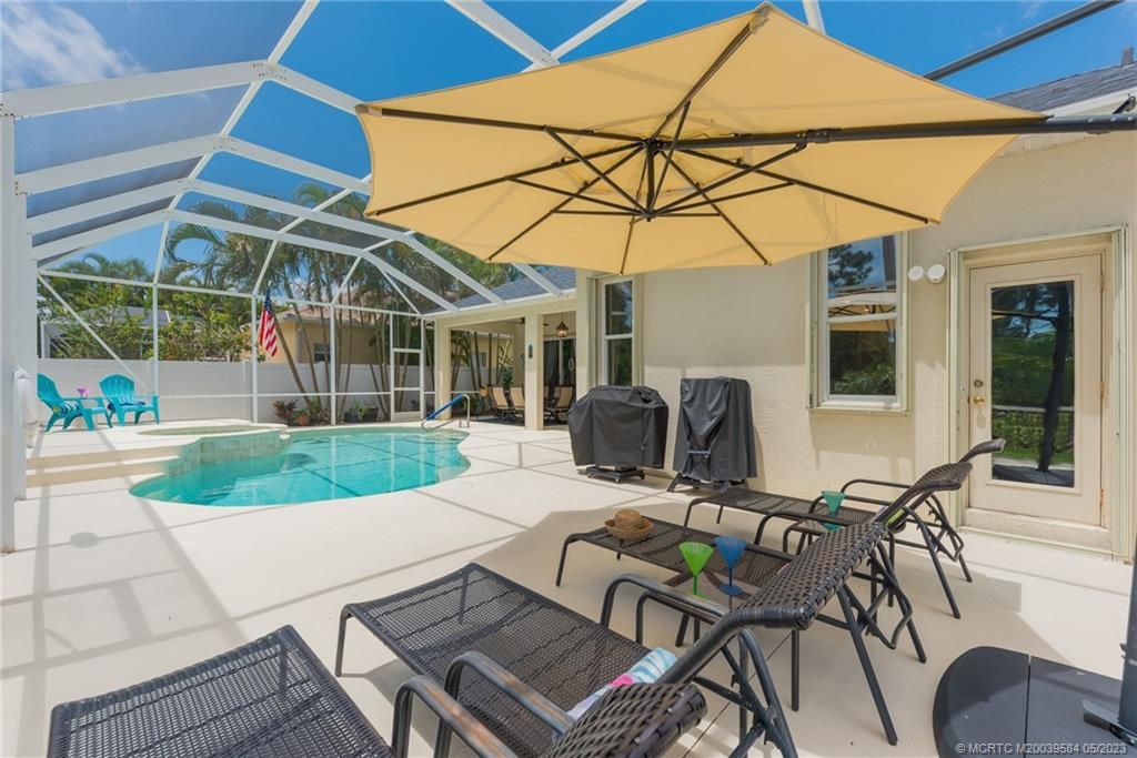 Photo of 2251 NW Windemere Drive, Jensen Beach, FL 34957 (MLS # M20039584)