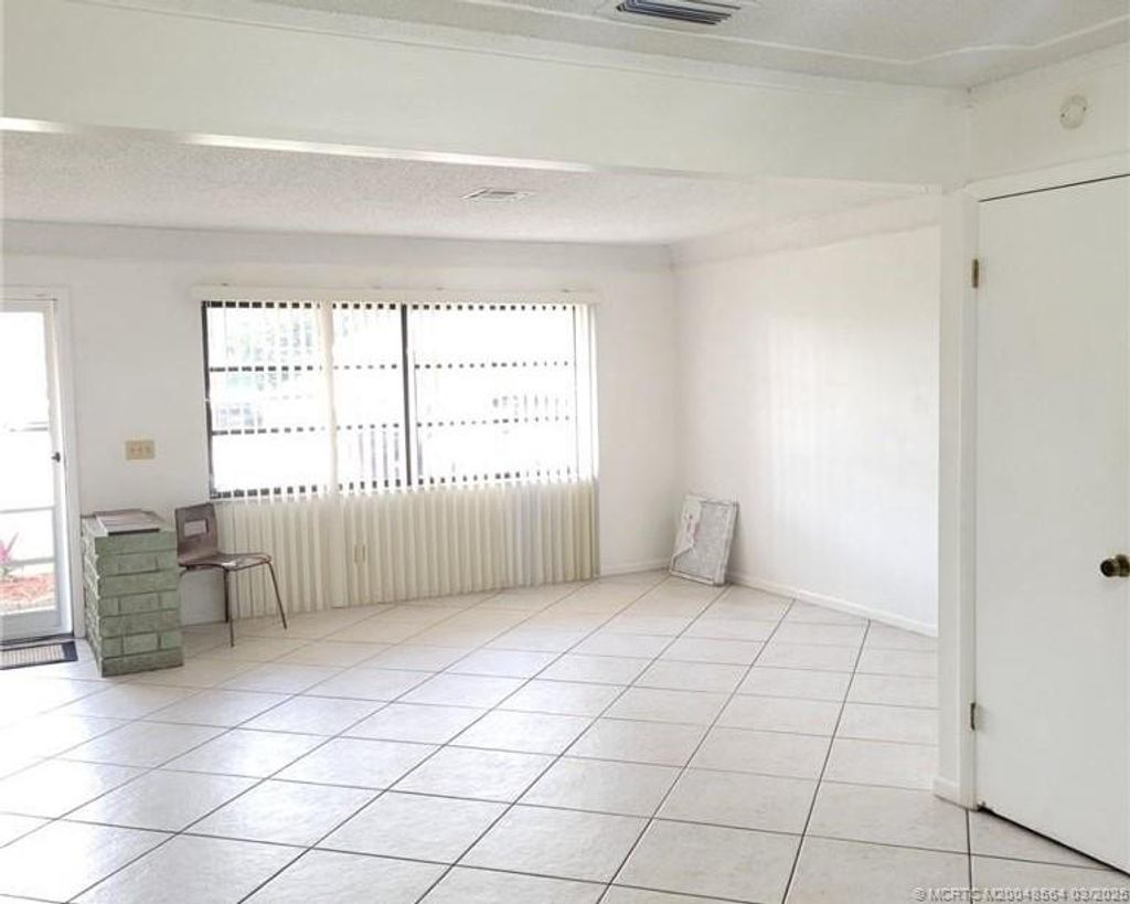 Photo of 349 NW Curtis Street, Port Saint Lucie, FL 34983 (MLS # M20048564)