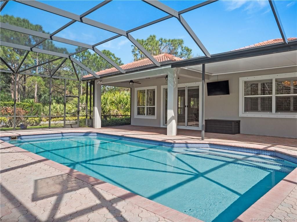 Photo of 4860 SW Hammock Creek Drive, Palm City, FL 34990 (MLS # M20048791)