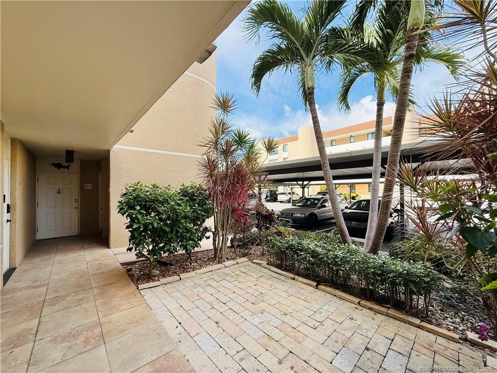 Photo of 3432 NE Causeway Blvd. #104, Jensen Beach, FL 34957 (MLS # M20055395)