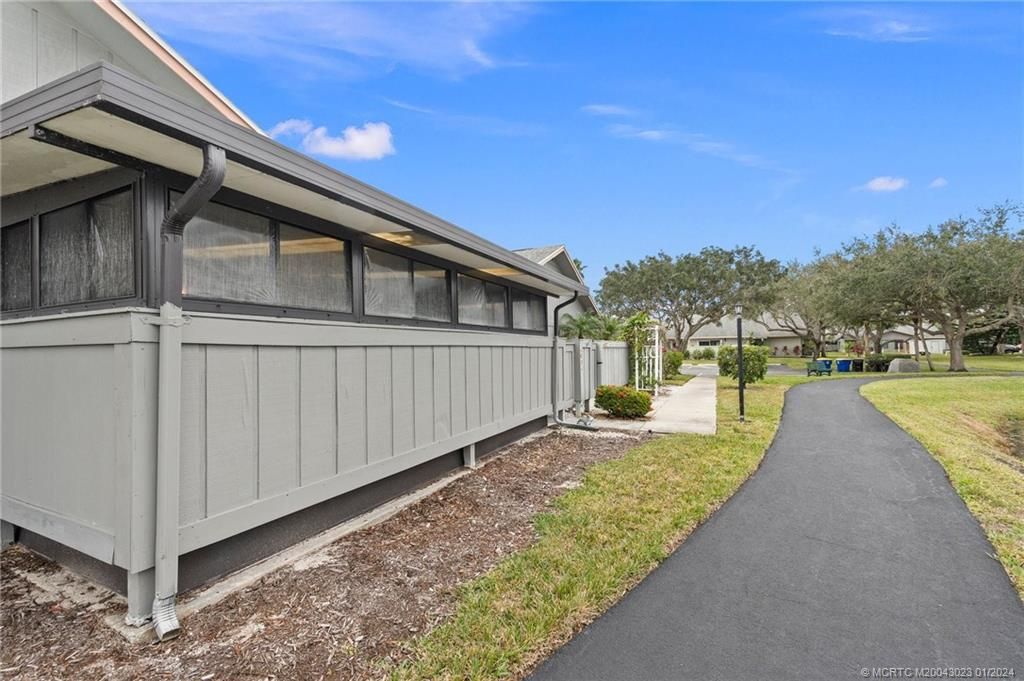 Photo of 4094 NW Cinnamon Tree Circle, Jensen Beach, FL 34957 (MLS # M20043023)