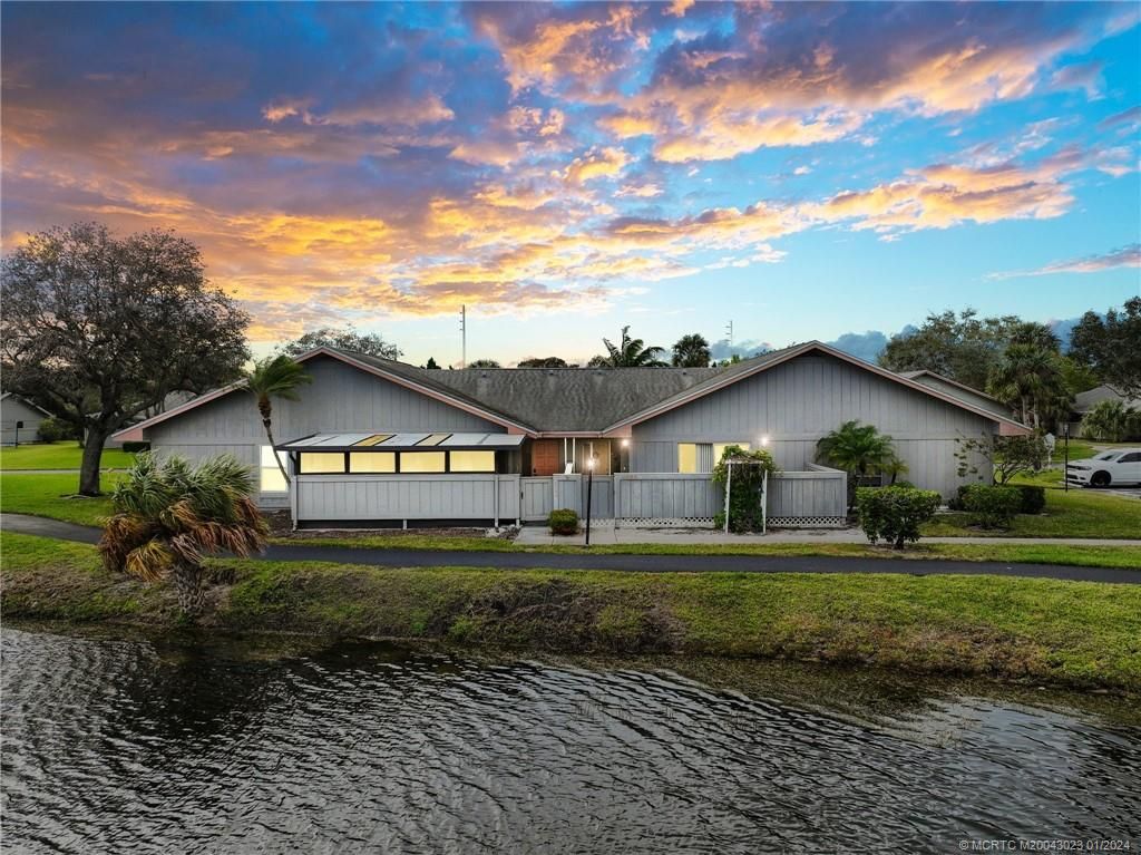 Photo of 4094 NW Cinnamon Tree Circle, Jensen Beach, FL 34957 (MLS # M20043023)