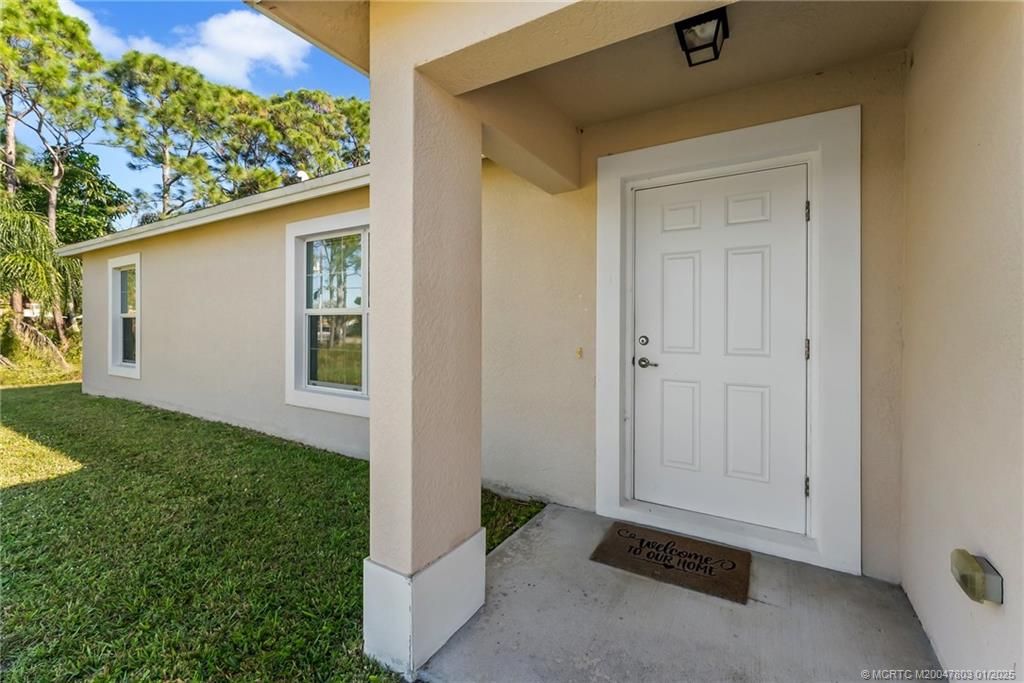 Photo of 2281 SE Monitor Street, Port Saint Lucie, FL 34952 (MLS # M20047803)