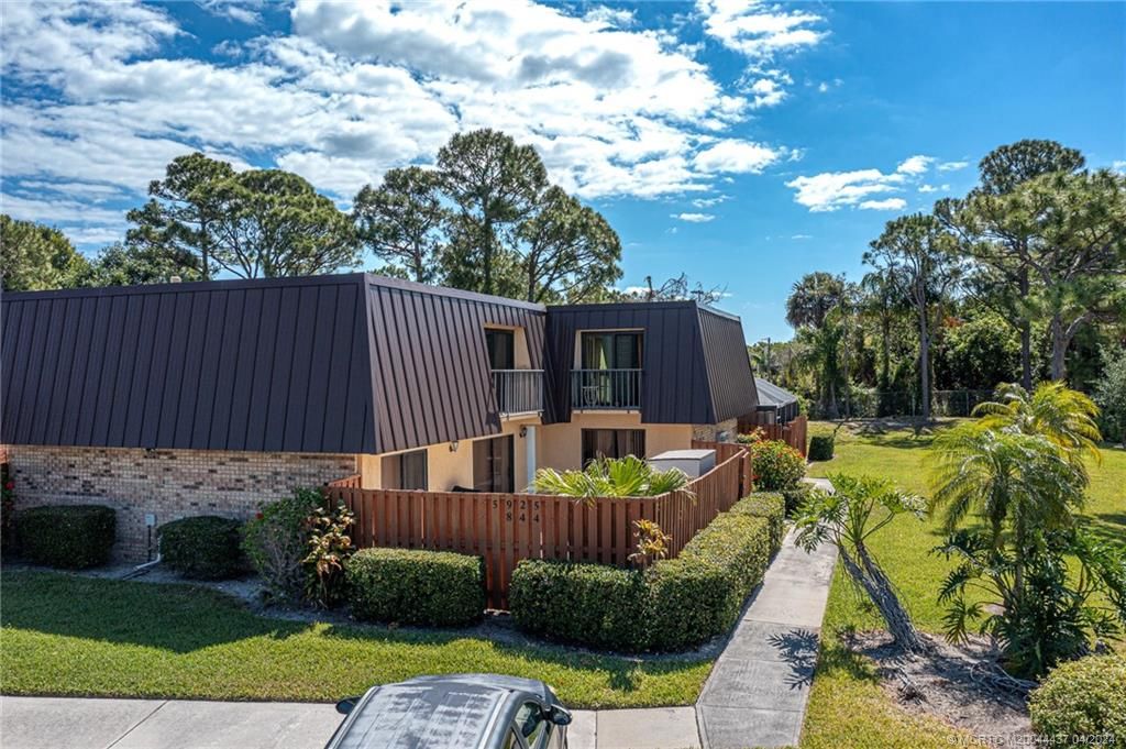 Photo of 5925 SE Windsong Lane, Stuart, FL 34997 (MLS # M20044437)