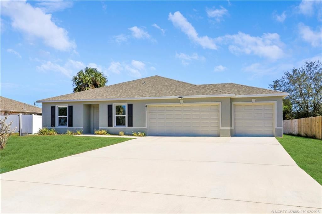 Photo of 411 SW Doreen Street, Port Saint Lucie, FL 34983 (MLS # M20054270)