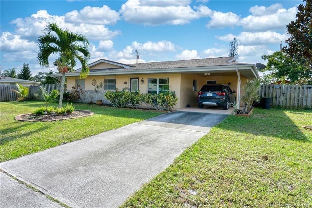 Photo of 108 SE Soneto Court, Port St. Lucie-River Park, FL 34983 (MLS # M20036908)