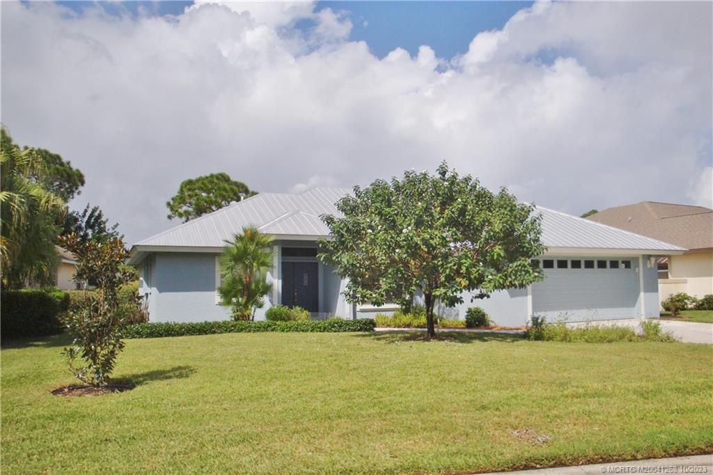 Photo of 1939 SW Oak Ridge Road, Palm City, FL 34990 (MLS # M20041268)