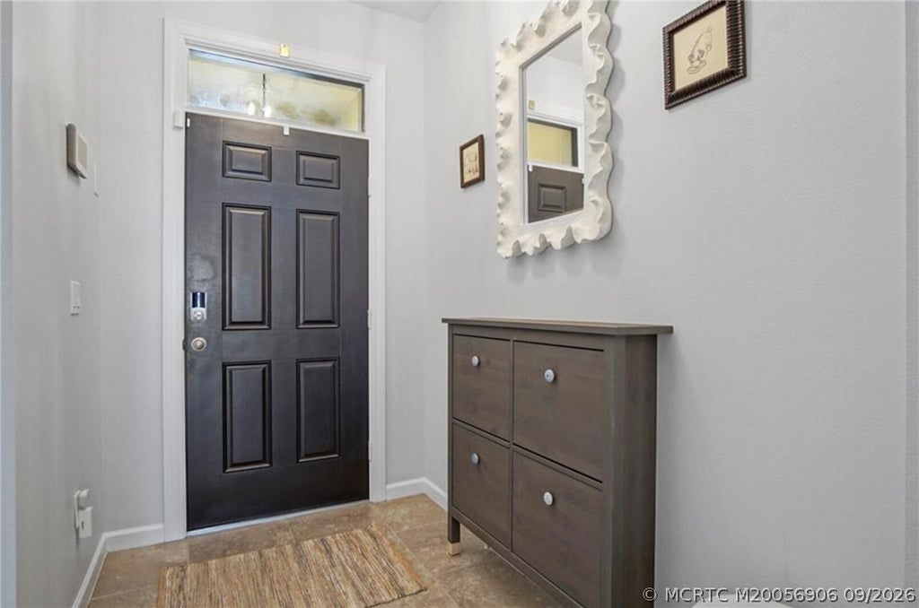 Photo of 10568 SW Cambria Lane, Port Saint Lucie, FL 34987 (MLS # M20056906)