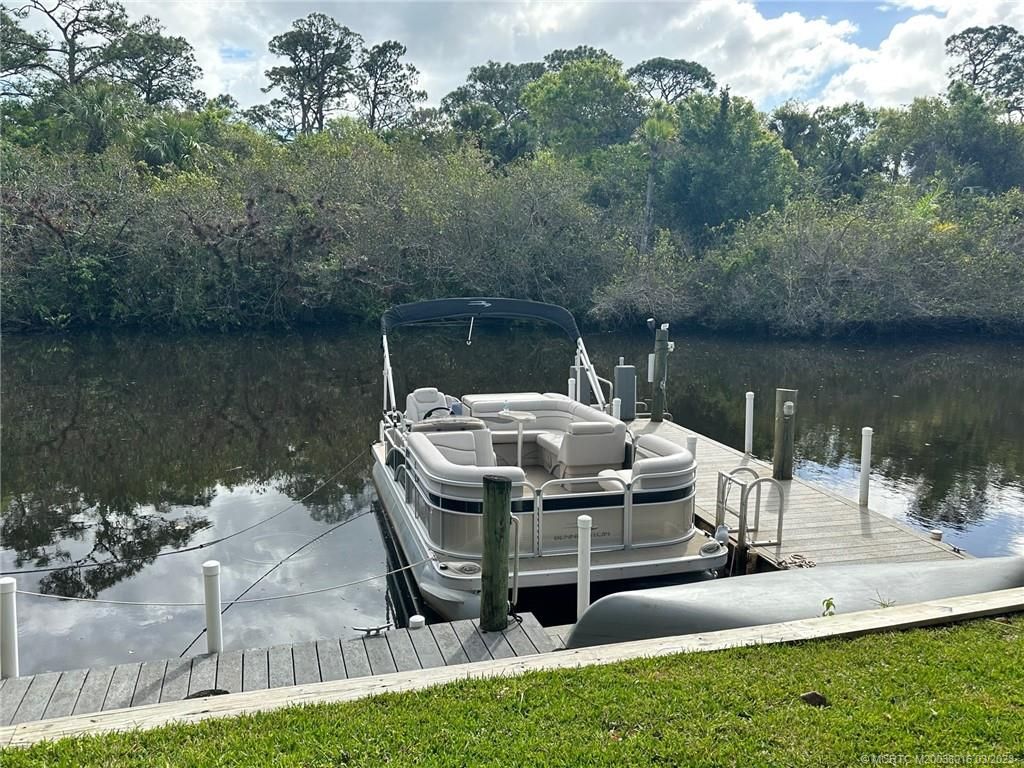 Photo of 7911 SE Paradise Drive, Stuart, FL 34997 (MLS # M20038016)