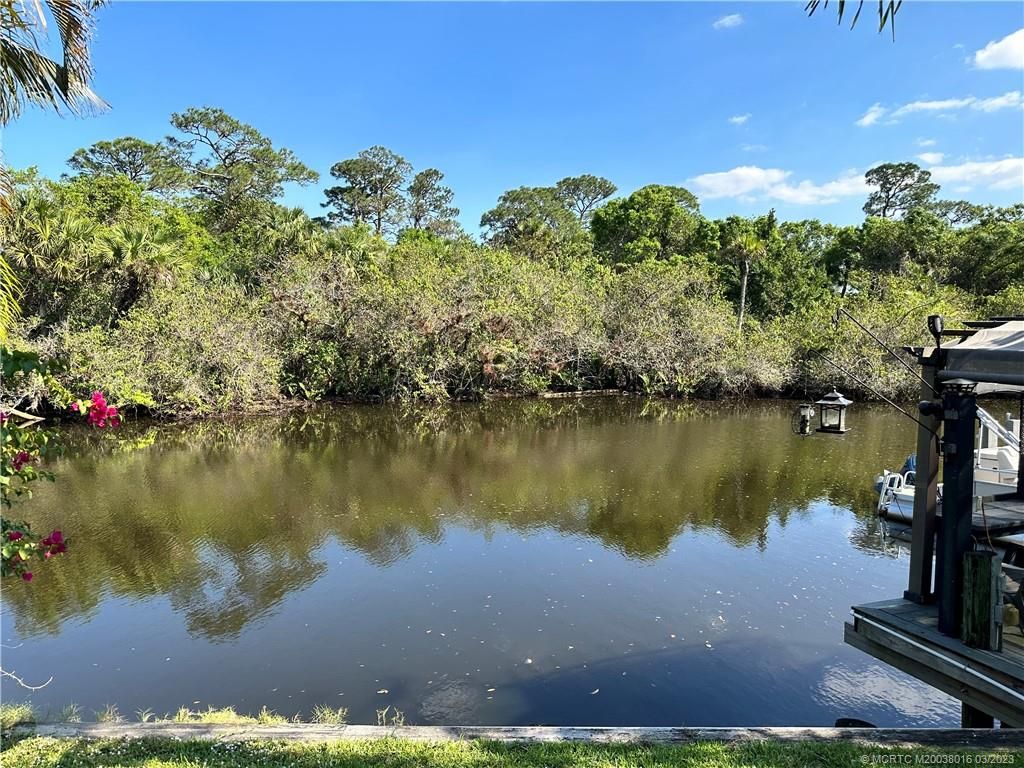 Photo of 7911 SE Paradise Drive, Stuart, FL 34997 (MLS # M20038016)