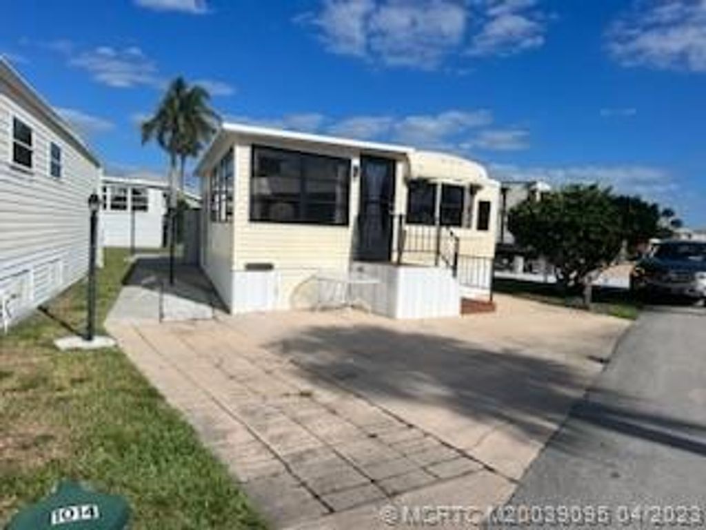 Photo of 1014 Nettles Boulevard, Jensen Beach, FL 34957 (MLS # M20039095)