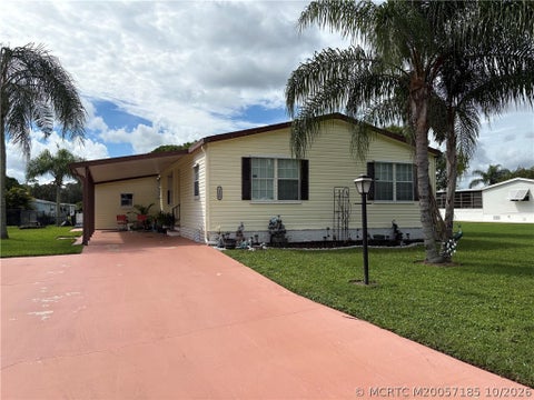 Photo of 2460 SW Versailles Terrace, Stuart, FL 34997 (MLS # M20057185)