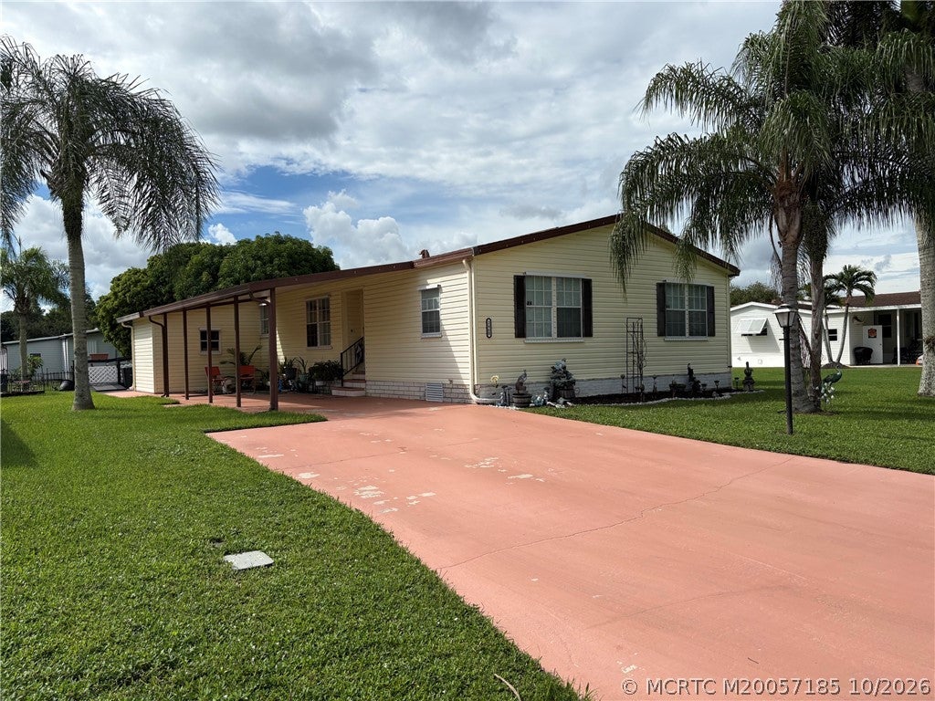 Photo of 2460 SW Versailles Terrace, Stuart, FL 34997 (MLS # M20057185)