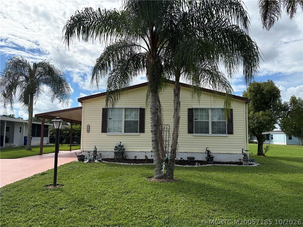 Photo of 2460 SW Versailles Terrace, Stuart, FL 34997 (MLS # M20057185)