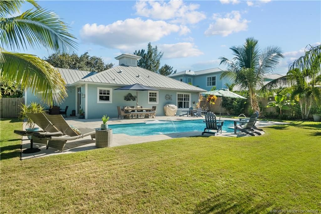 Photo of 9333 SE Saturn Street, Hobe Sound, FL 33455 (MLS # M20041137)