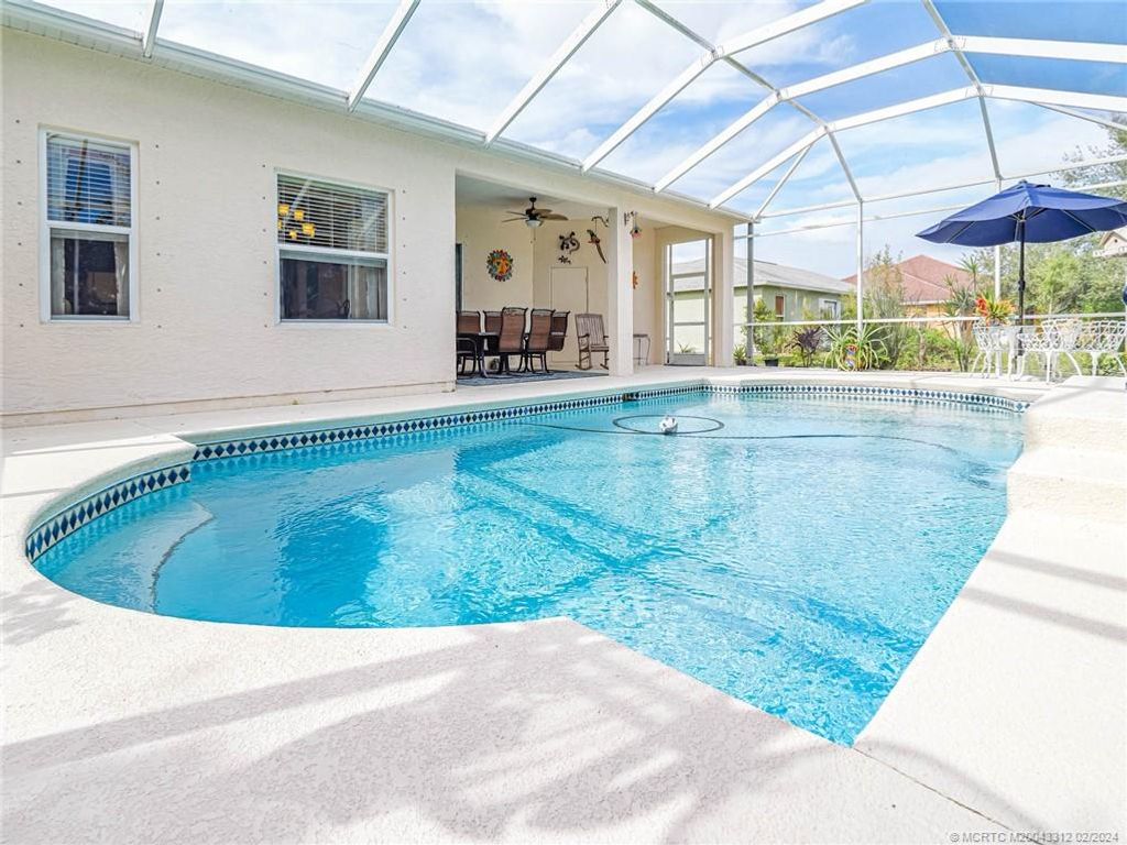 Photo of 2033 SW Beekman Street, Port Saint Lucie, FL 34953 (MLS # M20043312)