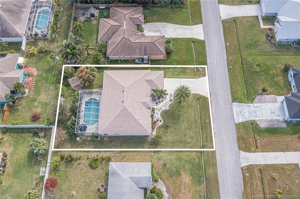 Photo of 2033 SW Beekman Street, Port Saint Lucie, FL 34953 (MLS # M20043312)